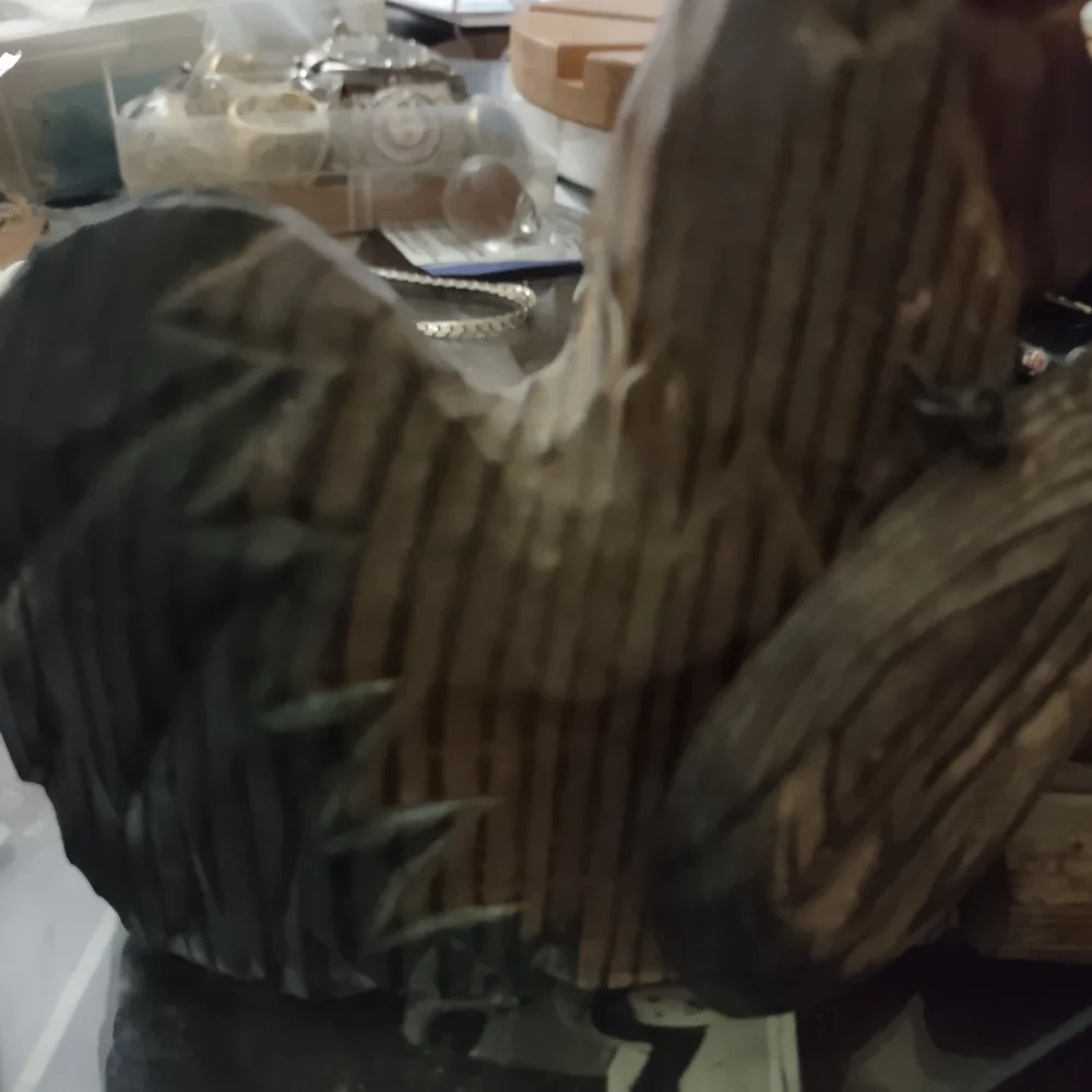 Wooden Bird Figurine with Purple and Brown Accents